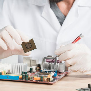 technician working on electronic equipment