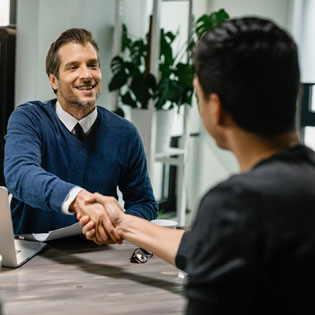 two men shaking hands