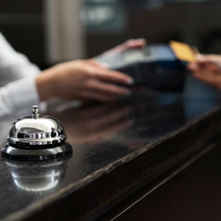 customer at hotel reception desk